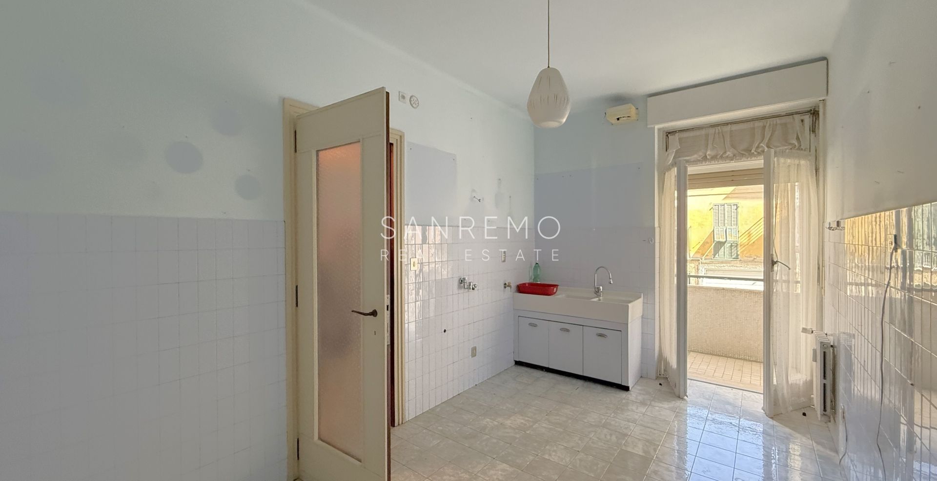 Luminoso trilocale con ampio terrazzo immerso nel verde