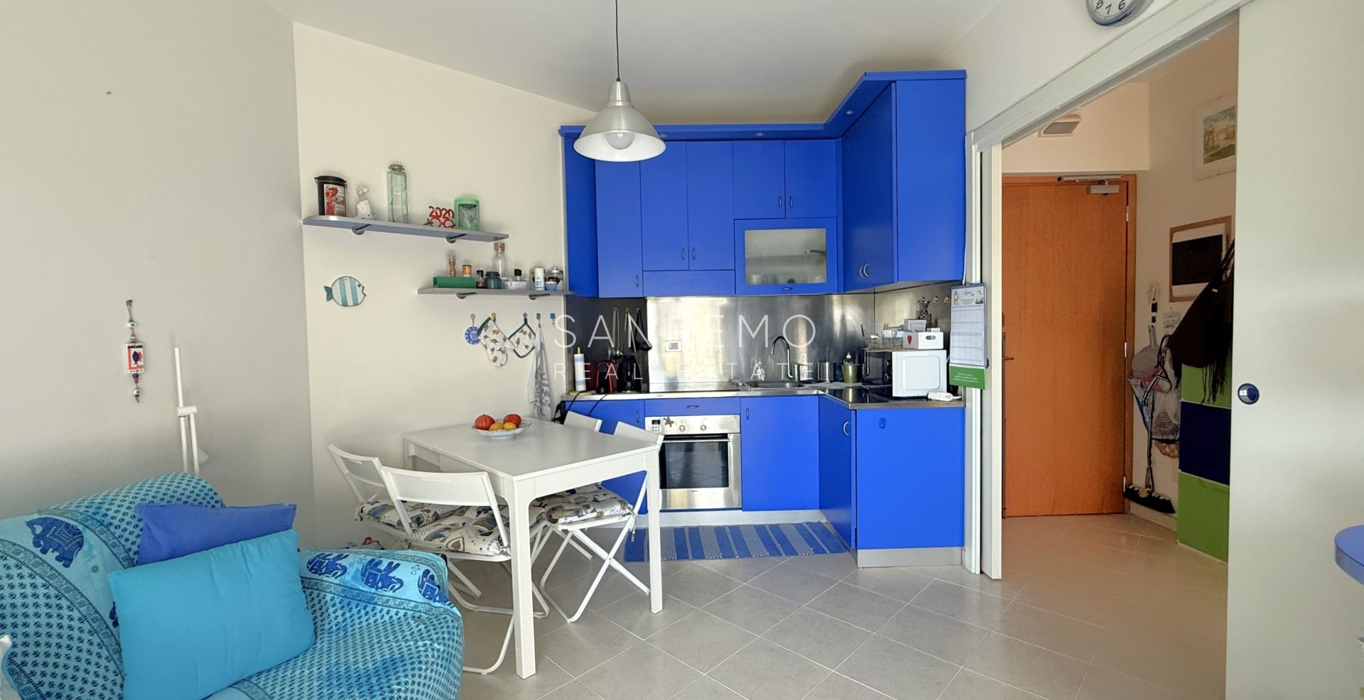  Grazioso bilocale con giardino privato e box auto