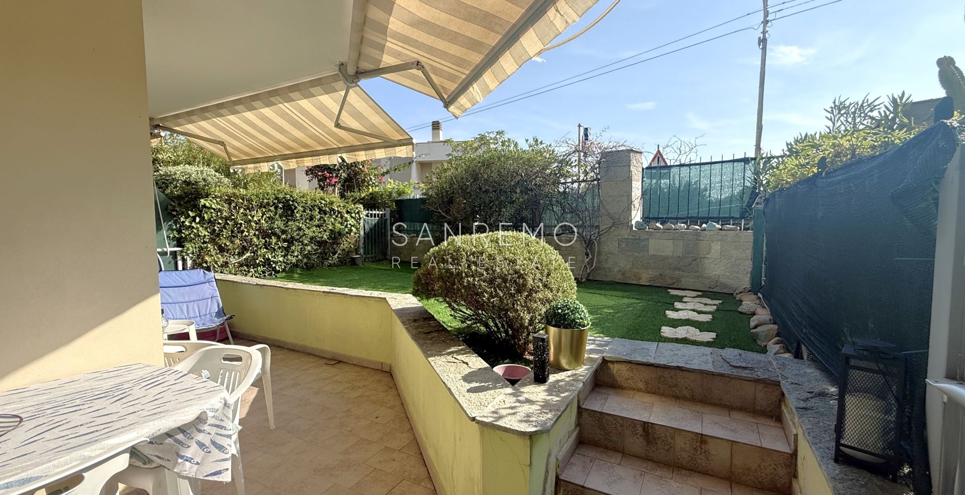  Grazioso bilocale con giardino privato e box auto